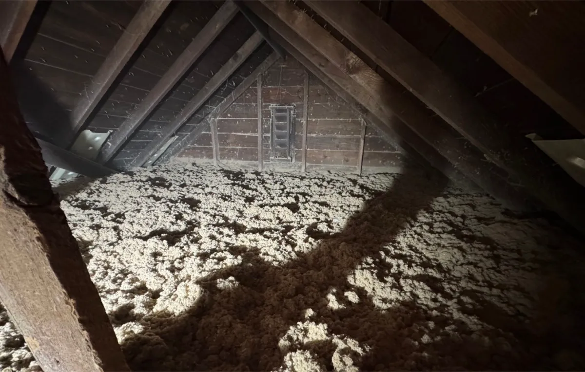Completed attic insulation covering entire floor with even depth - NY Energy Project