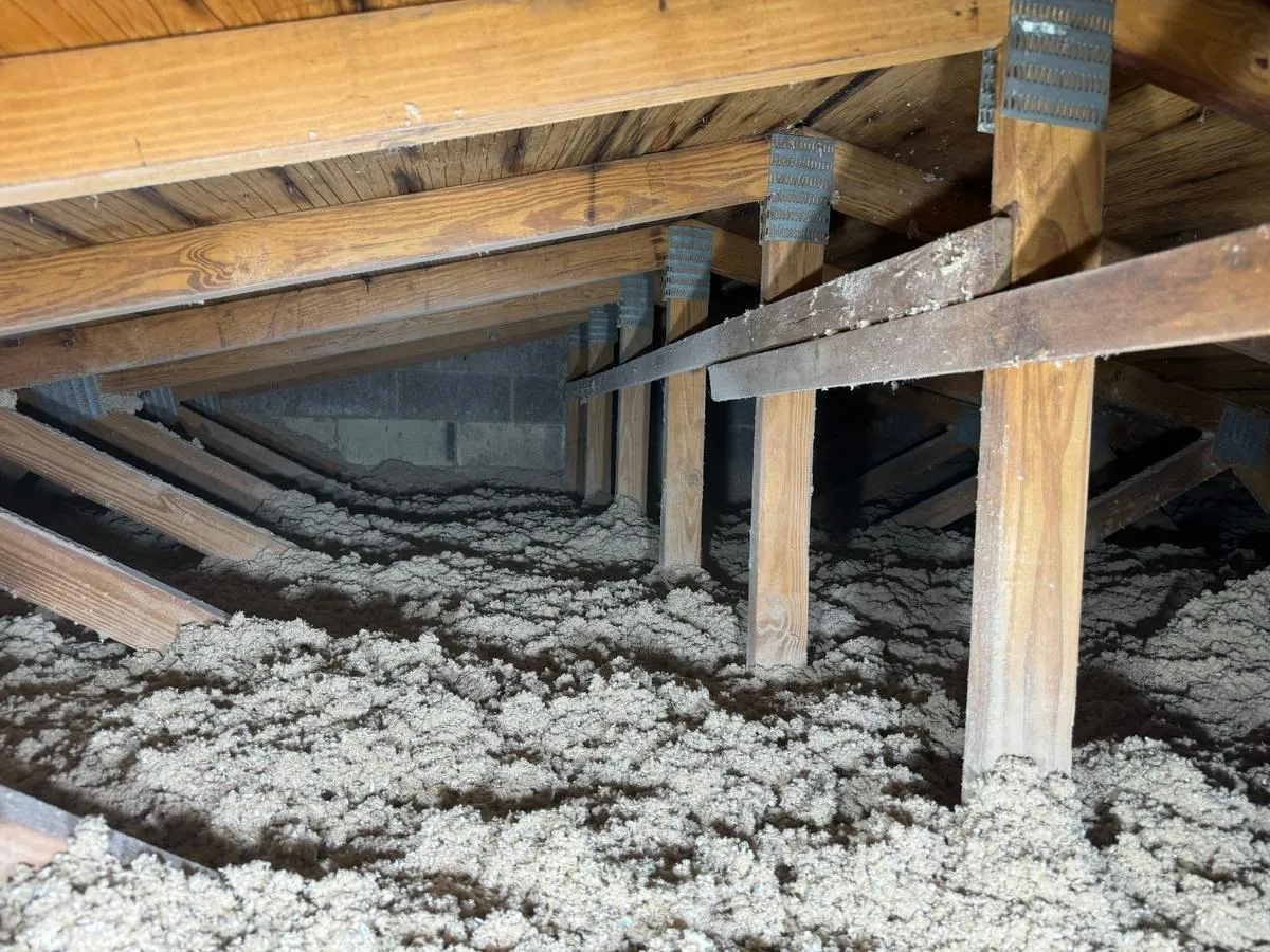 Cellulose blown-in insulation in a Brooklyn attic